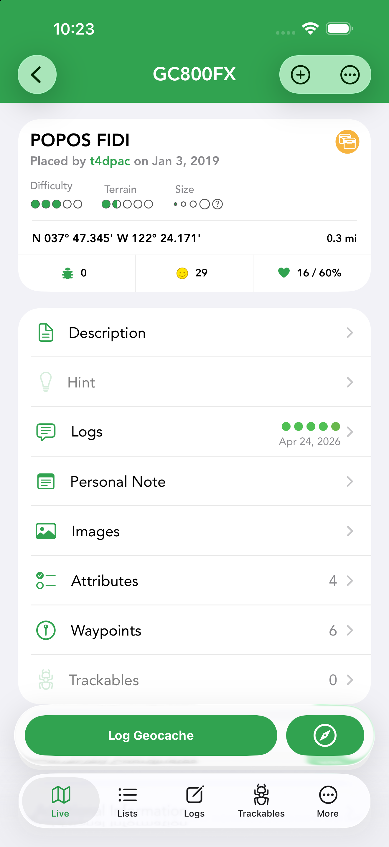 The geocache detail screen: header, coordinates and distance, section rows, and the pinned Log Geocache and navigate buttons.