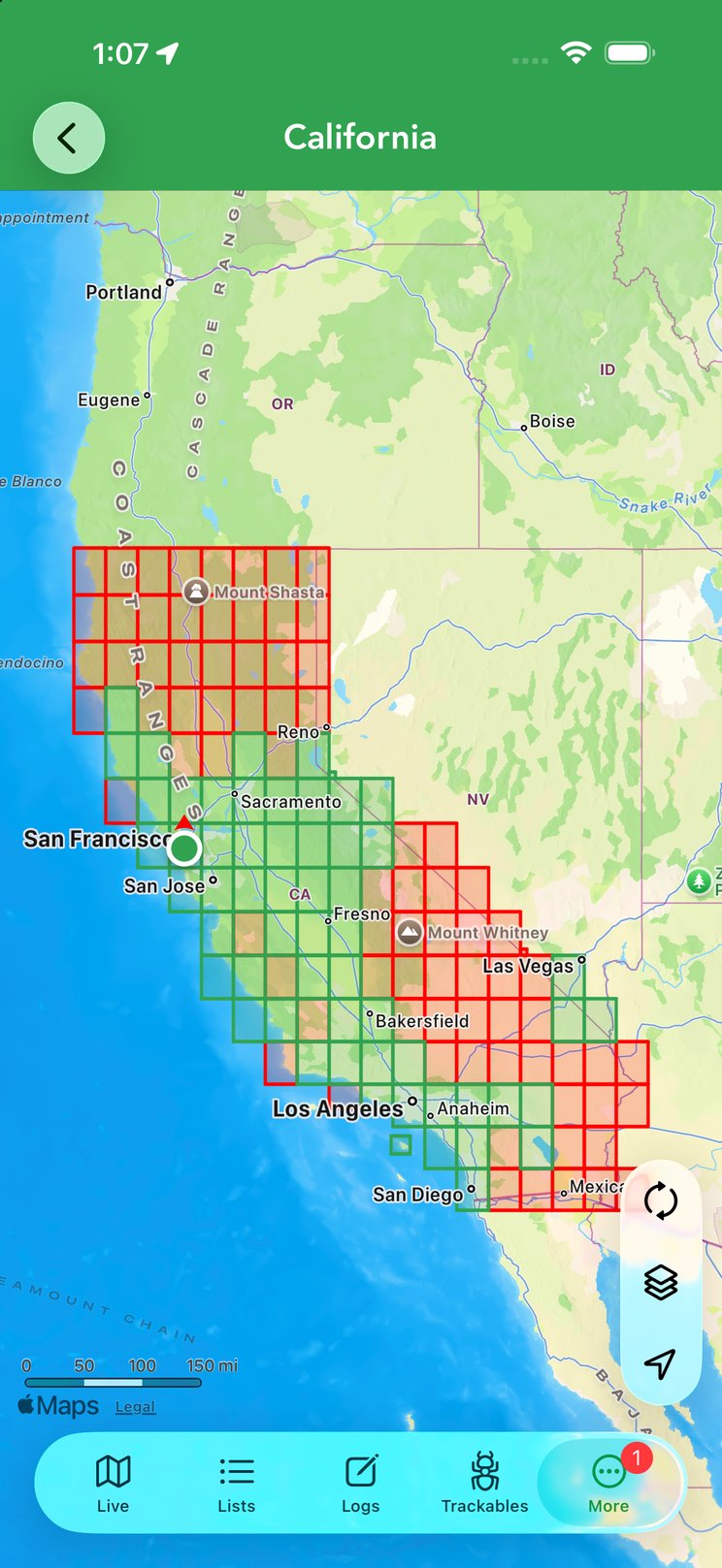 The DeLorme Grid draws atlas pages over the state — tap a green page to see your finds there.